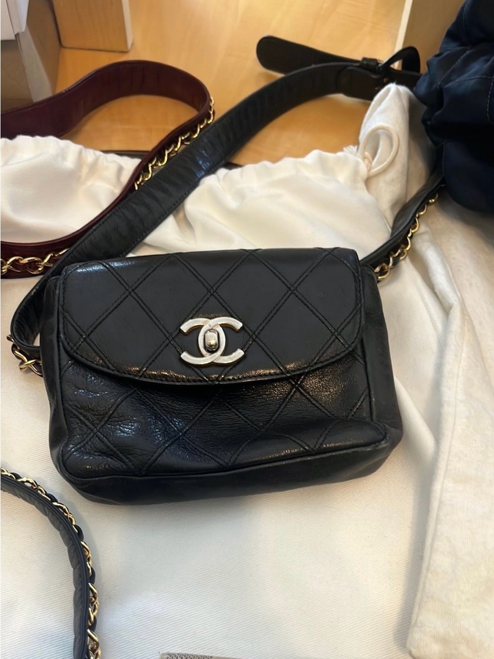 CHANEL Black Quilted Lambskin Small belt bag with Gold CC